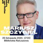 Plakat informujący o spotkaniu z Mariuszem Szczygłem